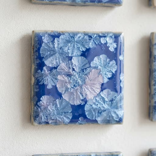 Handcrafted ceramic dome wall installation by Lagomá